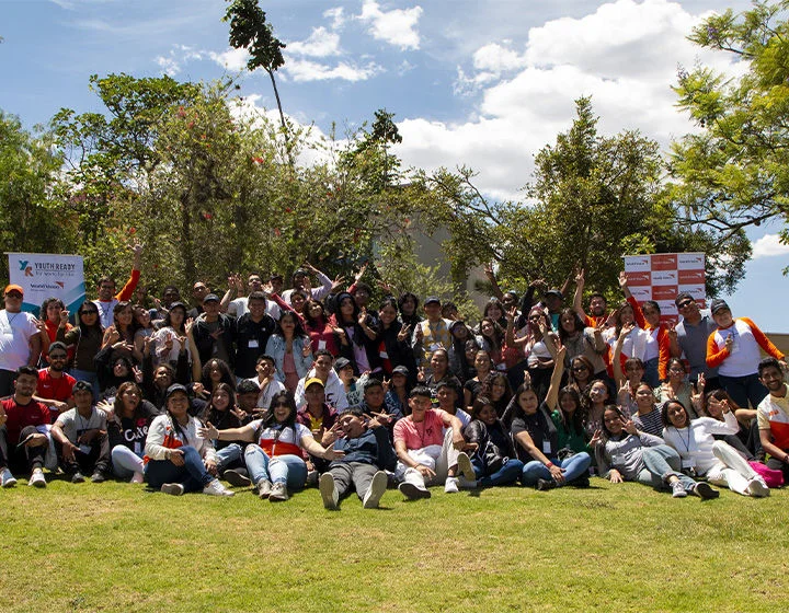 Youth Ready participants in Ecuador smile brightly after completing a session.
