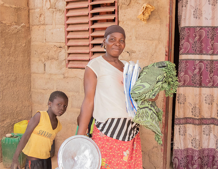 Zonaebo and her child received an emergency relief kit and cash assistance from World Vision. (Burkina Faso, 2023)